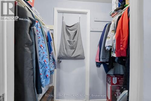 Primary Bedroom Good Size Walk In Closet - 1315 Jalna Boulevard, London, ON - Indoor With Storage