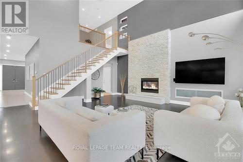 430 Lockmaster Crescent, Ottawa, ON - Indoor Photo Showing Living Room With Fireplace