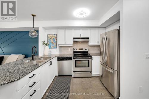 207 - 7730 Kipling Avenue, Vaughan, ON - Indoor Photo Showing Kitchen With Stainless Steel Kitchen With Double Sink