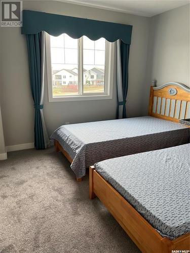 16 525 Mahabir Lane, Saskatoon, SK - Indoor Photo Showing Bedroom