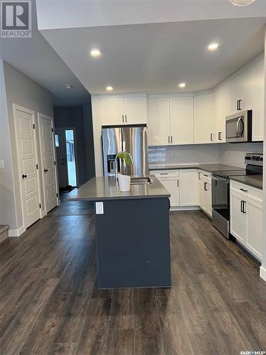 16 525 Mahabir Lane, Saskatoon, SK - Indoor Photo Showing Kitchen With Stainless Steel Kitchen