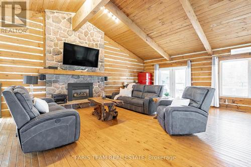 795744 Grey Road 19, Blue Mountains, ON - Indoor Photo Showing Living Room With Fireplace