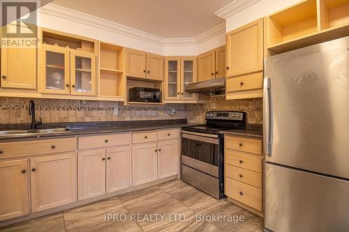 2102 - 100 Mornelle Court, Toronto, ON - Indoor Photo Showing Kitchen With Double Sink