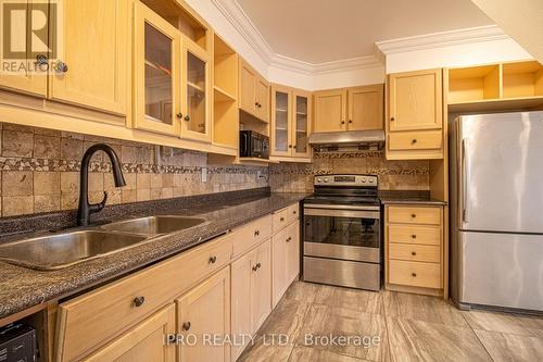 2102 - 100 Mornelle Court, Toronto, ON - Indoor Photo Showing Kitchen With Double Sink