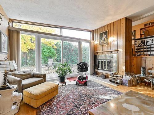 Salon - 2646 Crois. Marseille, Brossard, QC - Indoor Photo Showing Living Room With Fireplace