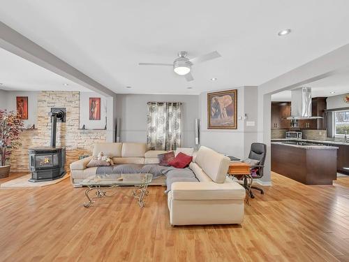 Salon - 531 Rue St-François-Xavier, Terrebonne (Terrebonne), QC - Indoor Photo Showing Living Room With Fireplace