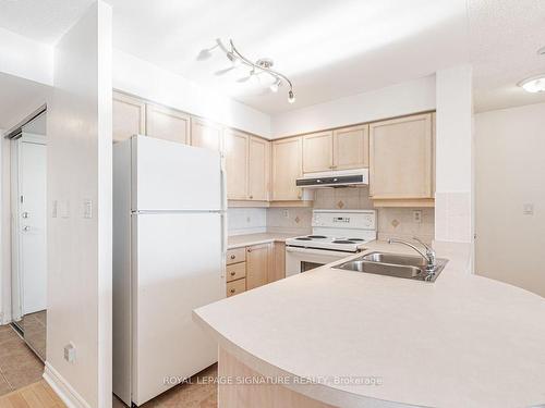 909-1 Rean Dr, Toronto, ON - Indoor Photo Showing Kitchen With Double Sink