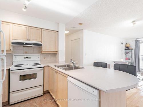 909-1 Rean Dr, Toronto, ON - Indoor Photo Showing Kitchen With Double Sink