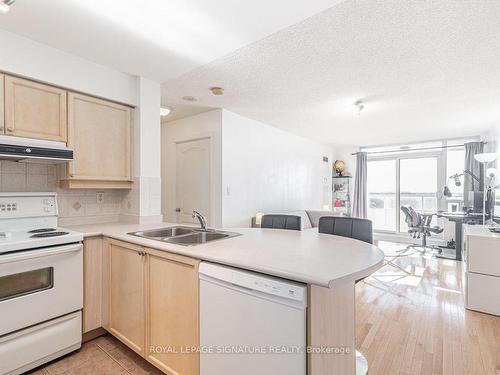 909-1 Rean Dr, Toronto, ON - Indoor Photo Showing Kitchen With Double Sink