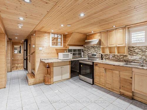 Bsmt-67 Ellington Dr, Toronto, ON - Indoor Photo Showing Kitchen With Double Sink