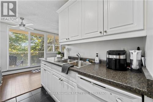 306 - 6390 Huggins Street, Niagara Falls (206 - Stamford), ON - Indoor Photo Showing Kitchen With Double Sink