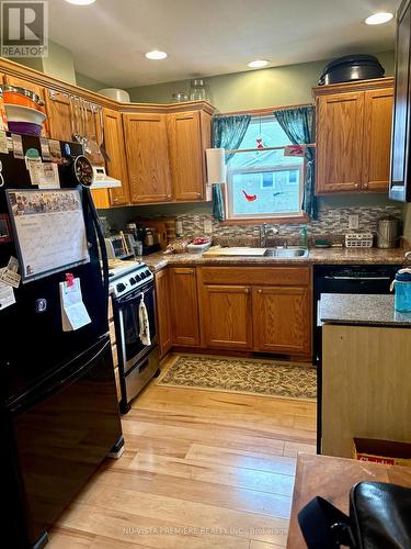 150 Main Street, North Middlesex (Parkhill), ON - Indoor Photo Showing Kitchen With Double Sink