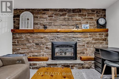 10 Birchwood Drive, Barrie, ON - Indoor Photo Showing Living Room With Fireplace