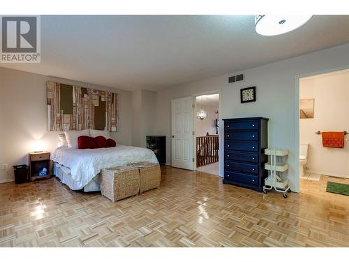 Large primary bedroom - 1675 Thayer Court Unit# 11, Kelowna, BC - Indoor Photo Showing Bedroom