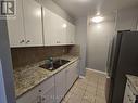 4 - 80 William Street W, Oshawa (O'Neill), ON  - Indoor Photo Showing Kitchen With Double Sink 