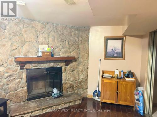 31 Bulbourne Road, Toronto, ON - Indoor Photo Showing Living Room With Fireplace