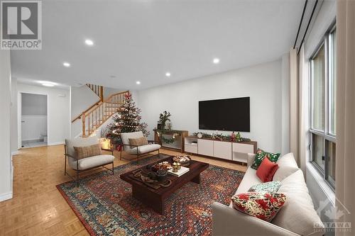 This Photo has been virtually staged. - 111 Beachview Private, Ottawa, ON - Indoor Photo Showing Living Room