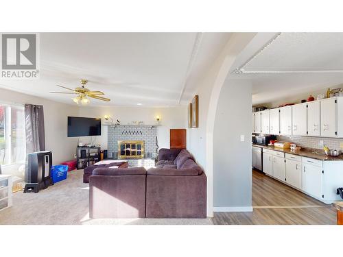 1229 Stork Avenue, Quesnel, BC - Indoor Photo Showing Living Room With Fireplace