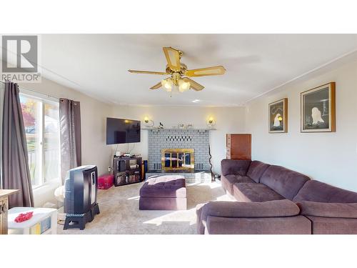 1229 Stork Avenue, Quesnel, BC - Indoor Photo Showing Living Room With Fireplace