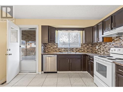 Main Floor - Kitchen - 965 Graham Rd Road, Kelowna, BC - Indoor Photo Showing Kitchen With Double Sink