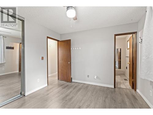 Main Floor - Bedroom 2 - 965 Graham Rd Road, Kelowna, BC - Indoor Photo Showing Other Room