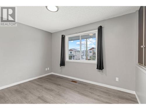 Main Floor - Bedroom 3 - 965 Graham Rd Road, Kelowna, BC - Indoor Photo Showing Other Room