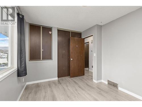 Main Floor - Bedroom 3 - 965 Graham Rd Road, Kelowna, BC - Indoor Photo Showing Other Room