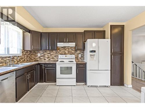 Main Floor - Kitchen - 965 Graham Rd Road, Kelowna, BC - Indoor Photo Showing Kitchen With Double Sink