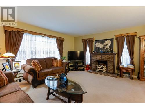 516 7Th Street, Kaslo, BC - Indoor Photo Showing Living Room With Fireplace