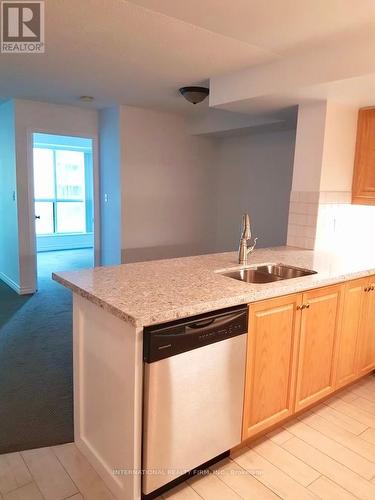 709 - 7 Lorraine Drive, Toronto, ON - Indoor Photo Showing Kitchen With Double Sink