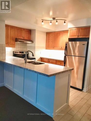 709 - 7 Lorraine Drive, Toronto, ON - Indoor Photo Showing Kitchen With Stainless Steel Kitchen