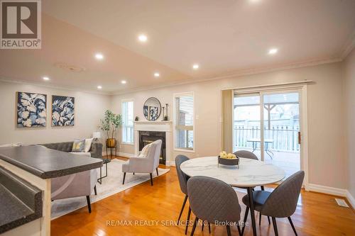 31 Silktop Trail, Brampton, ON - Indoor Photo Showing Dining Room With Fireplace