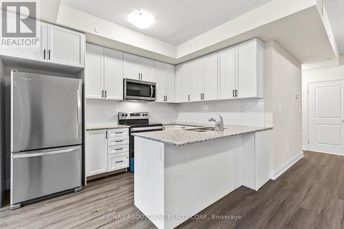 117 - 1569 Rose Way, Milton, ON - Indoor Photo Showing Kitchen With Stainless Steel Kitchen With Upgraded Kitchen