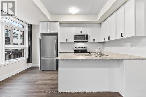 117 - 1569 Rose Way, Milton, ON - Indoor Photo Showing Kitchen With Stainless Steel Kitchen With Upgraded Kitchen