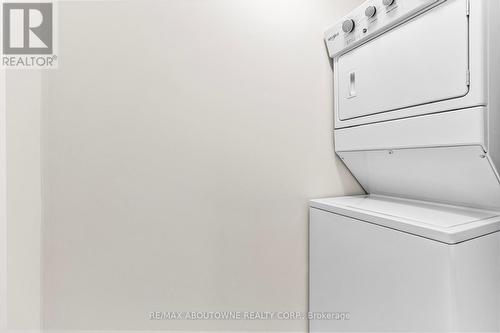 117 - 1569 Rose Way, Milton, ON - Indoor Photo Showing Laundry Room