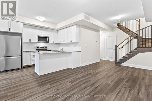 117 - 1569 Rose Way, Milton, ON - Indoor Photo Showing Kitchen With Stainless Steel Kitchen With Upgraded Kitchen