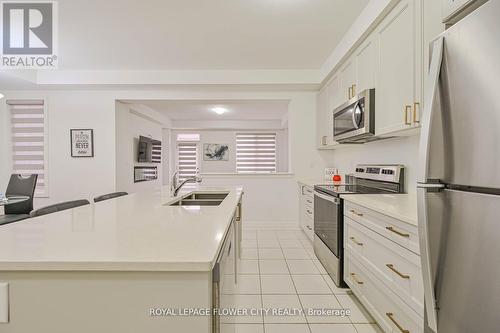 52 Melmar Street, Brampton, ON - Indoor Photo Showing Kitchen With Double Sink