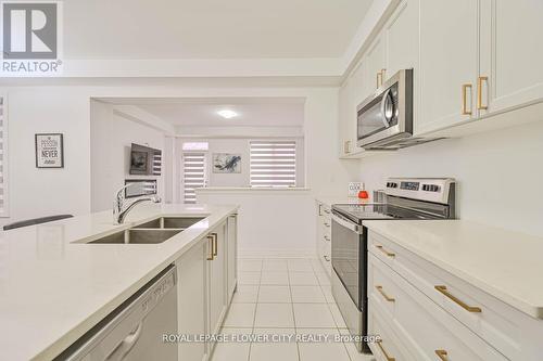 52 Melmar Street, Brampton, ON - Indoor Photo Showing Kitchen With Double Sink With Upgraded Kitchen