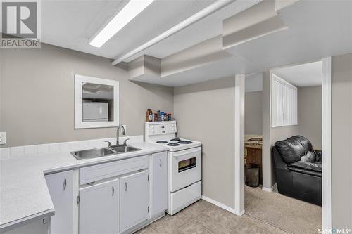 201 29Th Street W, Saskatoon, SK - Indoor Photo Showing Kitchen With Double Sink