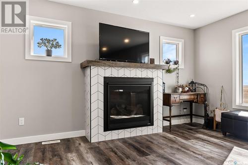 The Monk Acreage, Edenwold Rm No. 158, SK - Indoor Photo Showing Living Room With Fireplace