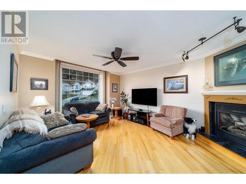 Livingroom - 1775 Ivans Court, Kelowna, BC - Indoor Photo Showing Living Room With Fireplace