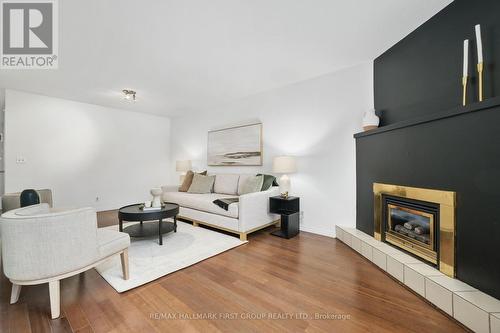 6 - 25 Progress Avenue, Belleville, ON - Indoor Photo Showing Living Room With Fireplace