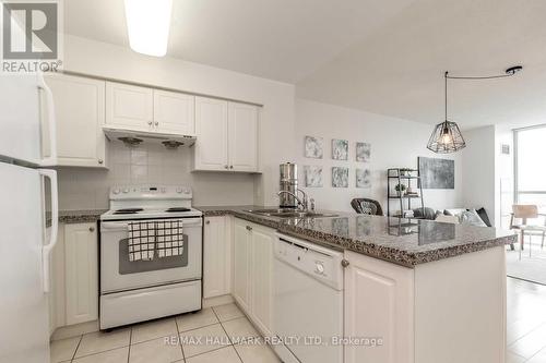 706 - 68 Grangeway Avenue, Toronto, ON - Indoor Photo Showing Kitchen With Double Sink