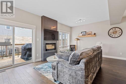 2479 Tokala Trail, London, ON - Indoor Photo Showing Living Room With Fireplace