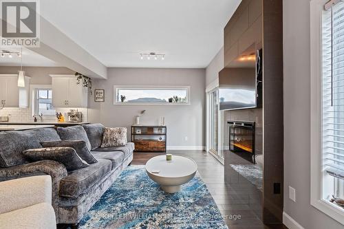 2479 Tokala Trail, London, ON - Indoor Photo Showing Living Room With Fireplace