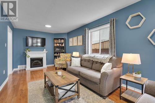 83 Sunrise Crescent, London, ON - Indoor Photo Showing Living Room With Fireplace