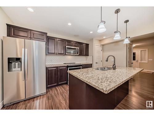 17126 38 St Nw, Edmonton, AB - Indoor Photo Showing Kitchen With Stainless Steel Kitchen With Double Sink With Upgraded Kitchen