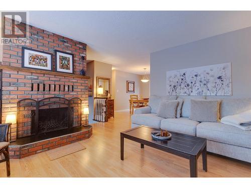 3282 Bellamy Road, Prince George, BC - Indoor Photo Showing Living Room With Fireplace