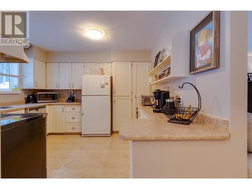 3282 Bellamy Road, Prince George, BC - Indoor Photo Showing Kitchen With Double Sink