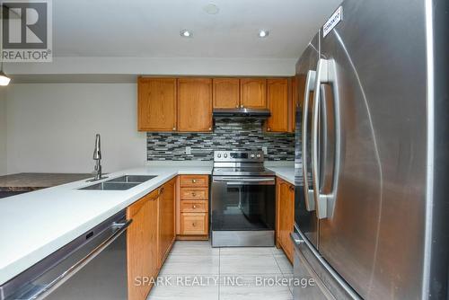 42 Winners Circle, Brampton, ON - Indoor Photo Showing Kitchen With Stainless Steel Kitchen With Double Sink